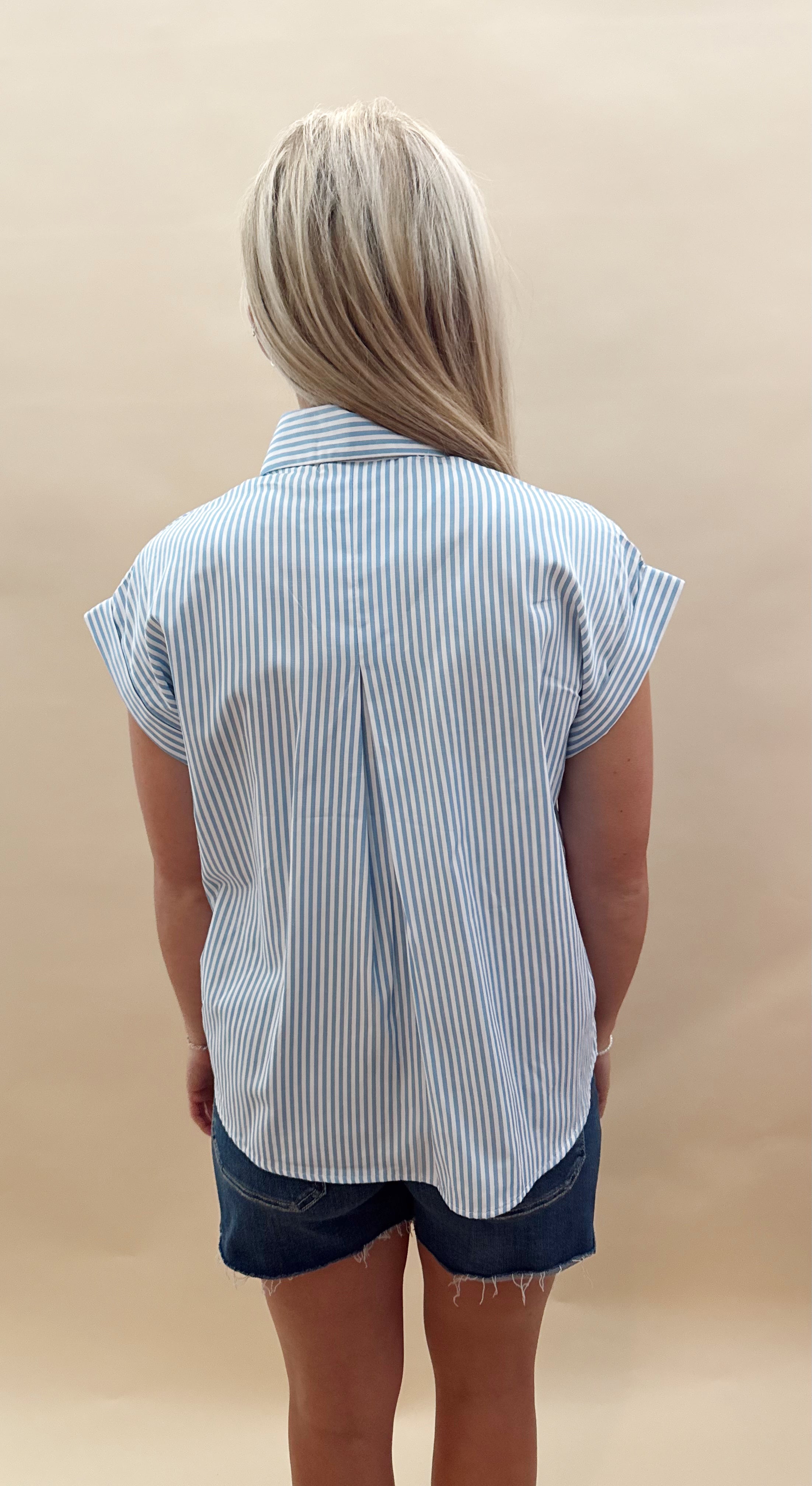 Blue and white striped top