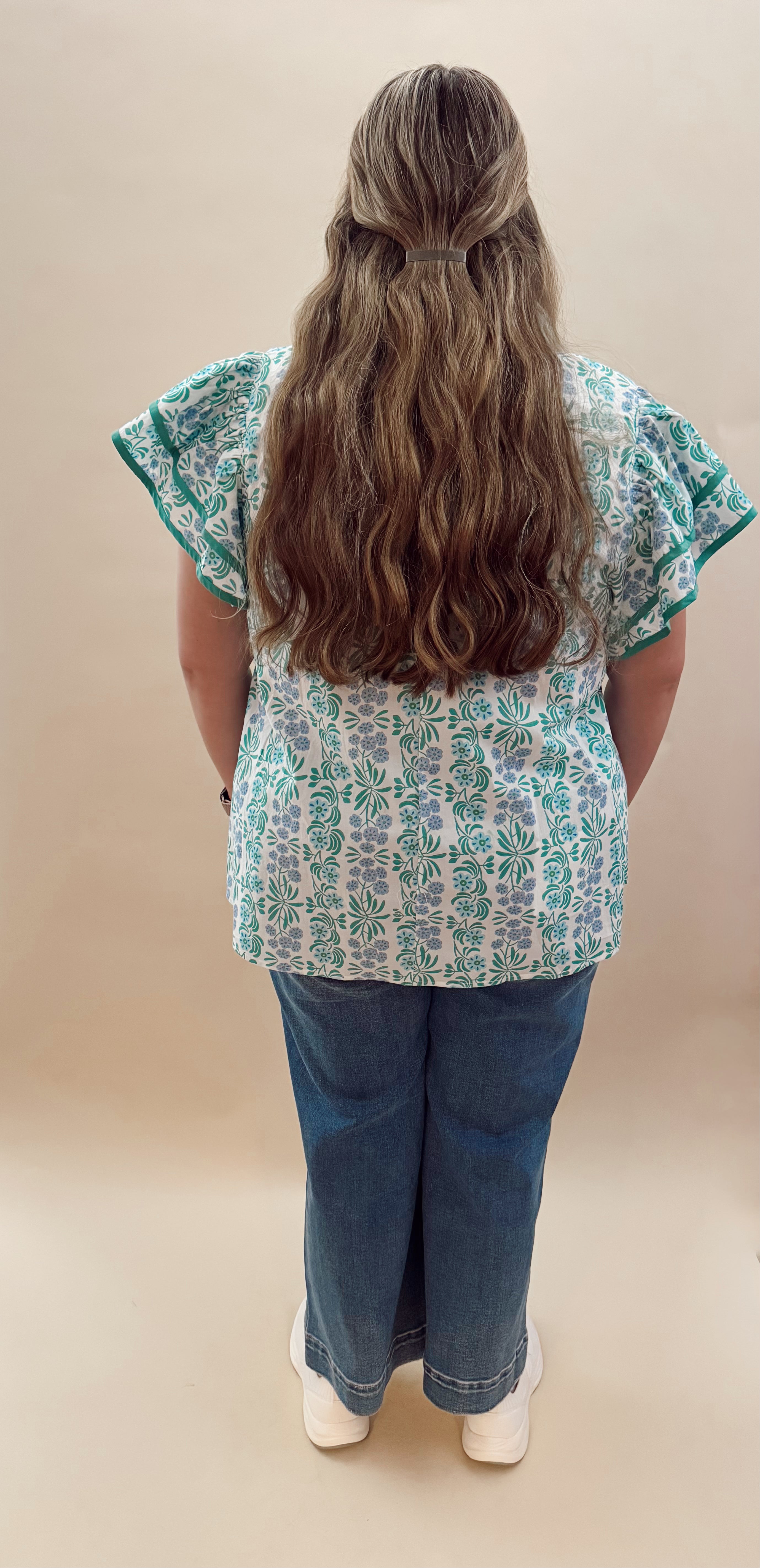 Blue and white floral blouse