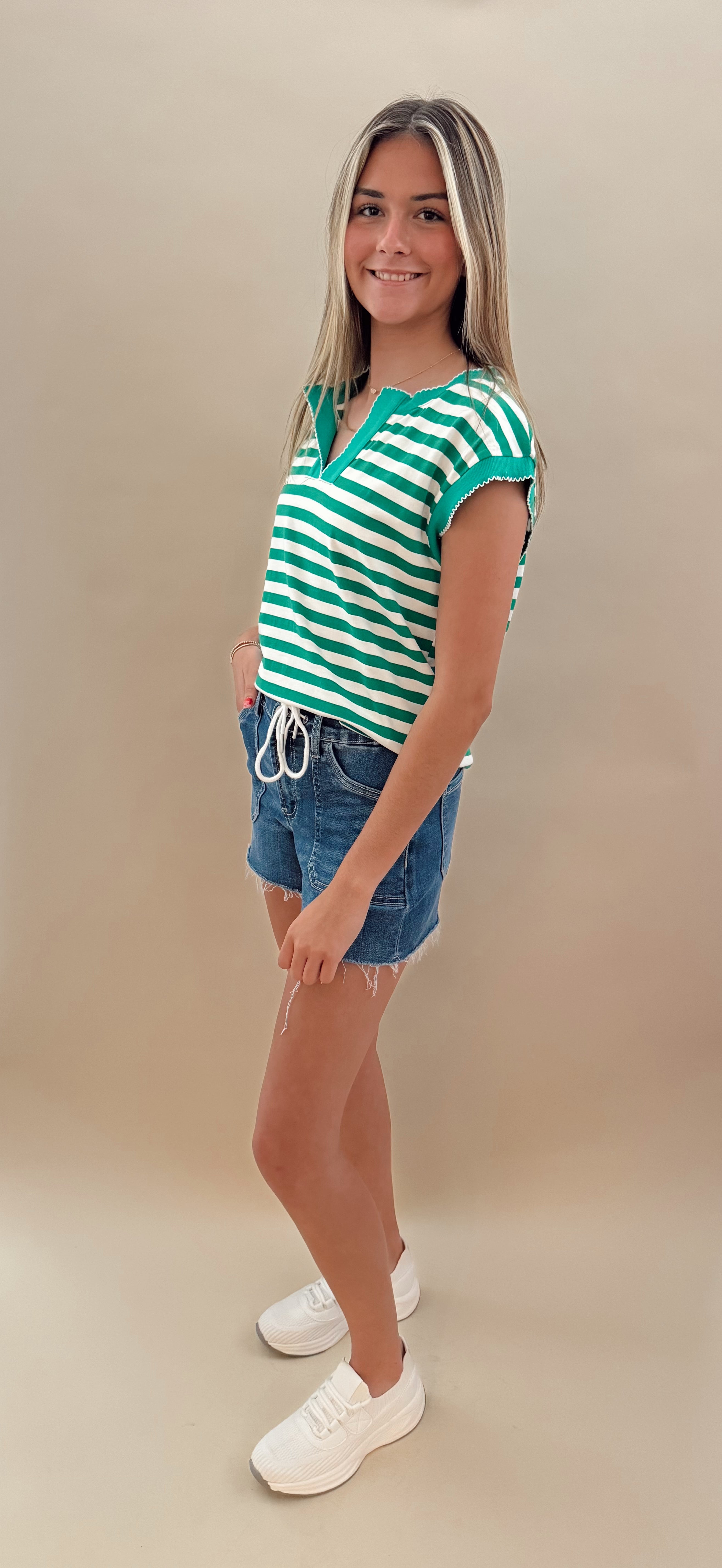 Green and white striped top