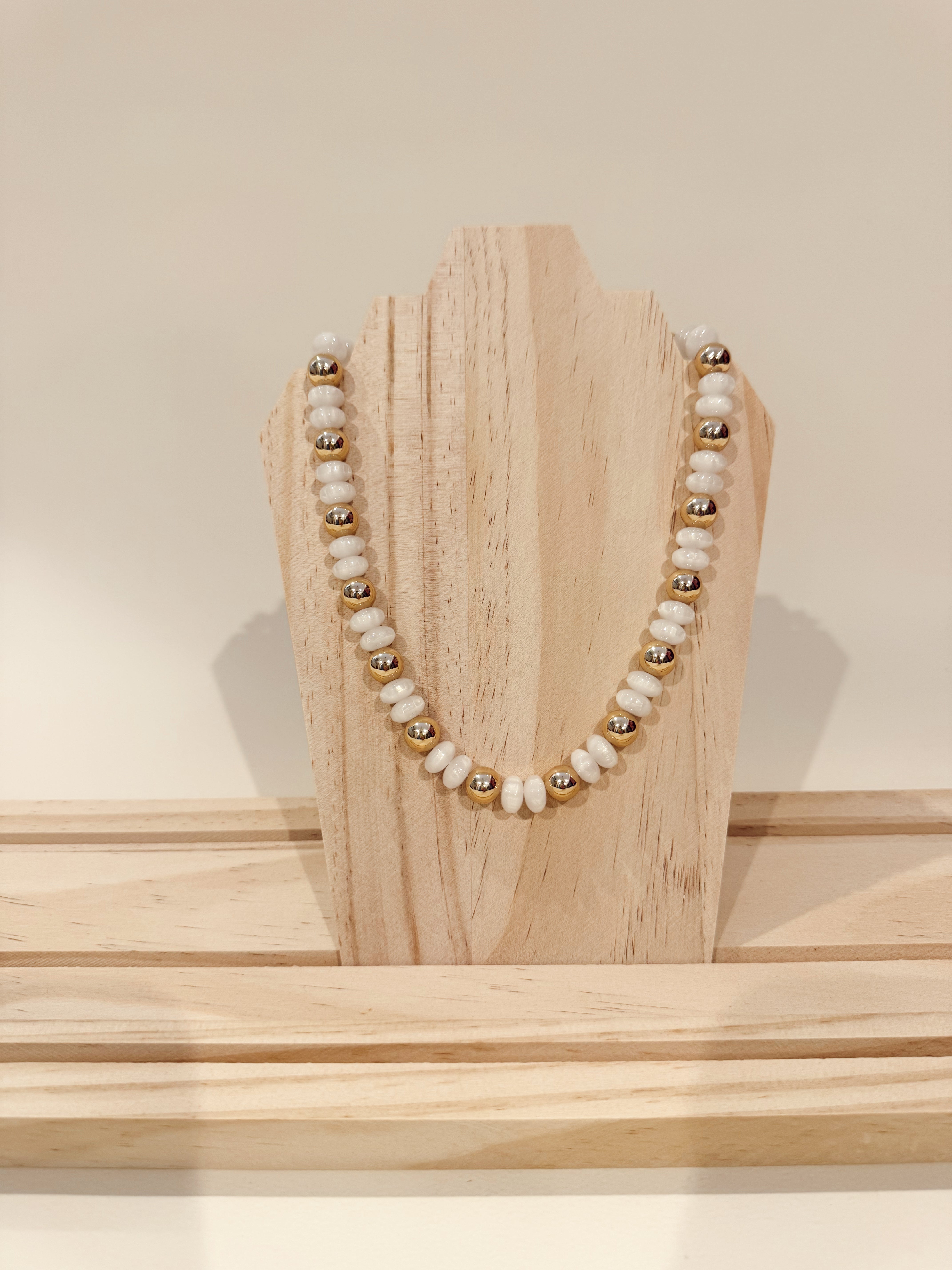 Bead and gold necklace
