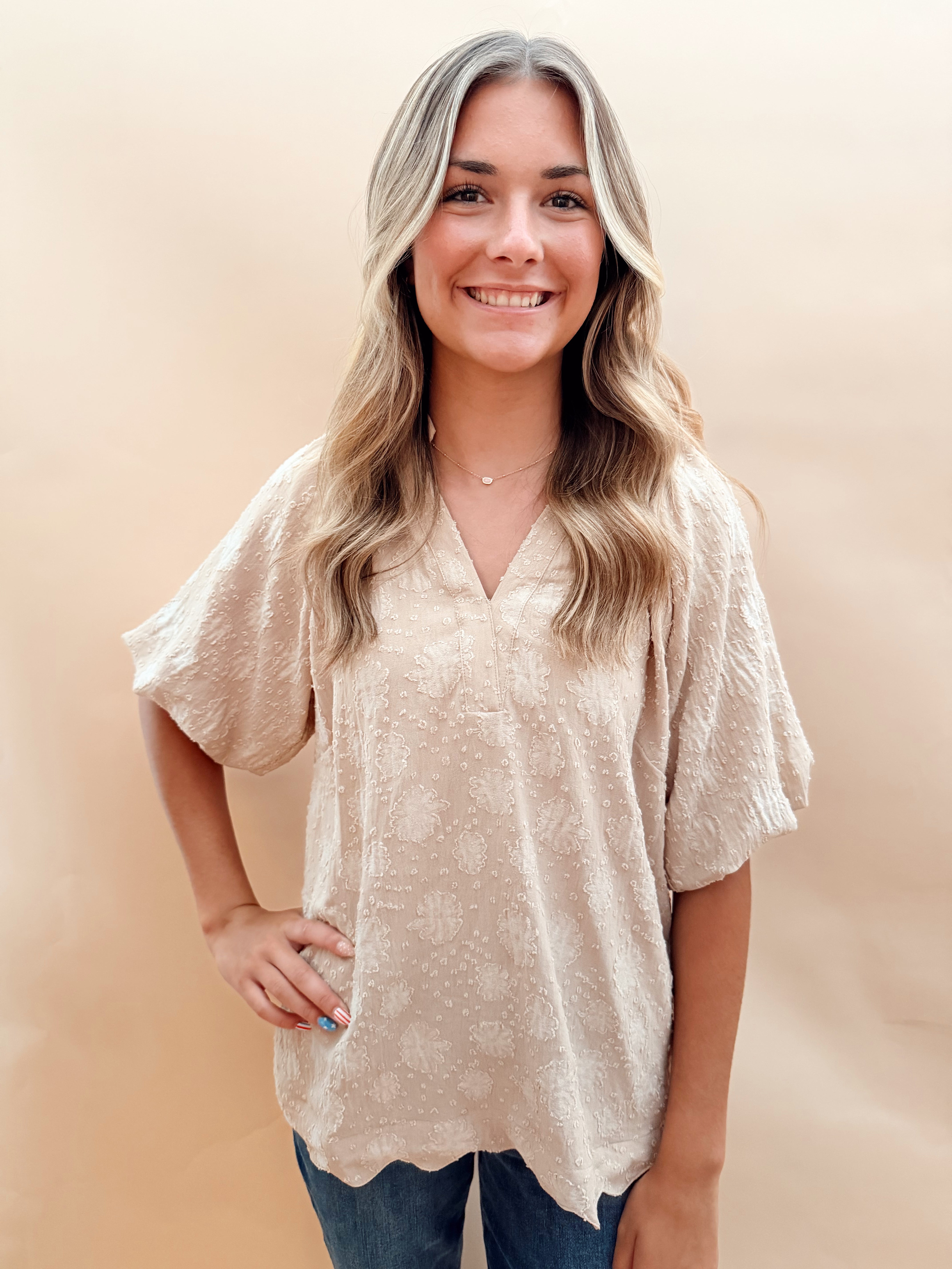 Scalloped hem bubble sleeve top