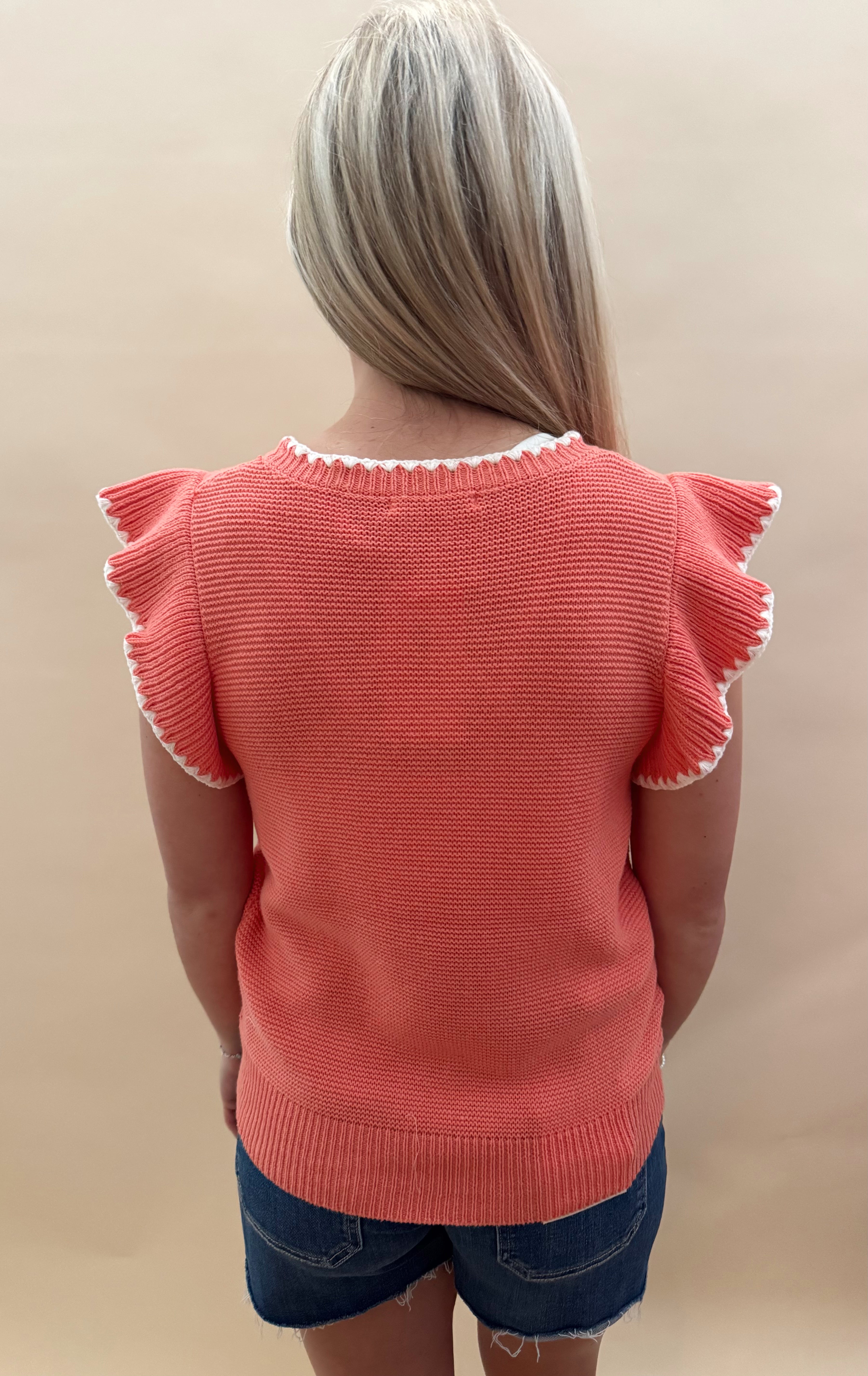 Coral short-sleeve knit top