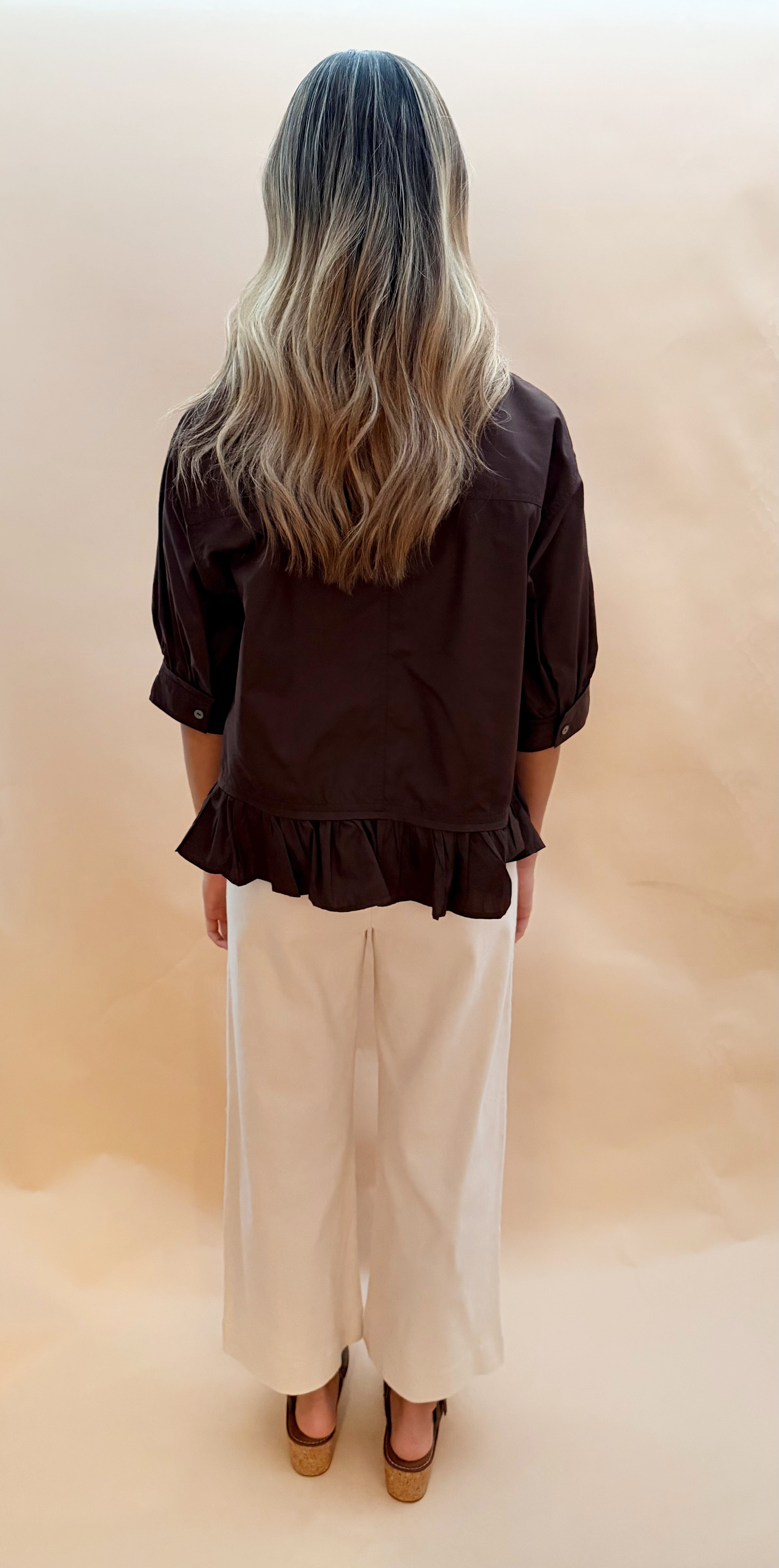 Solid peplum top