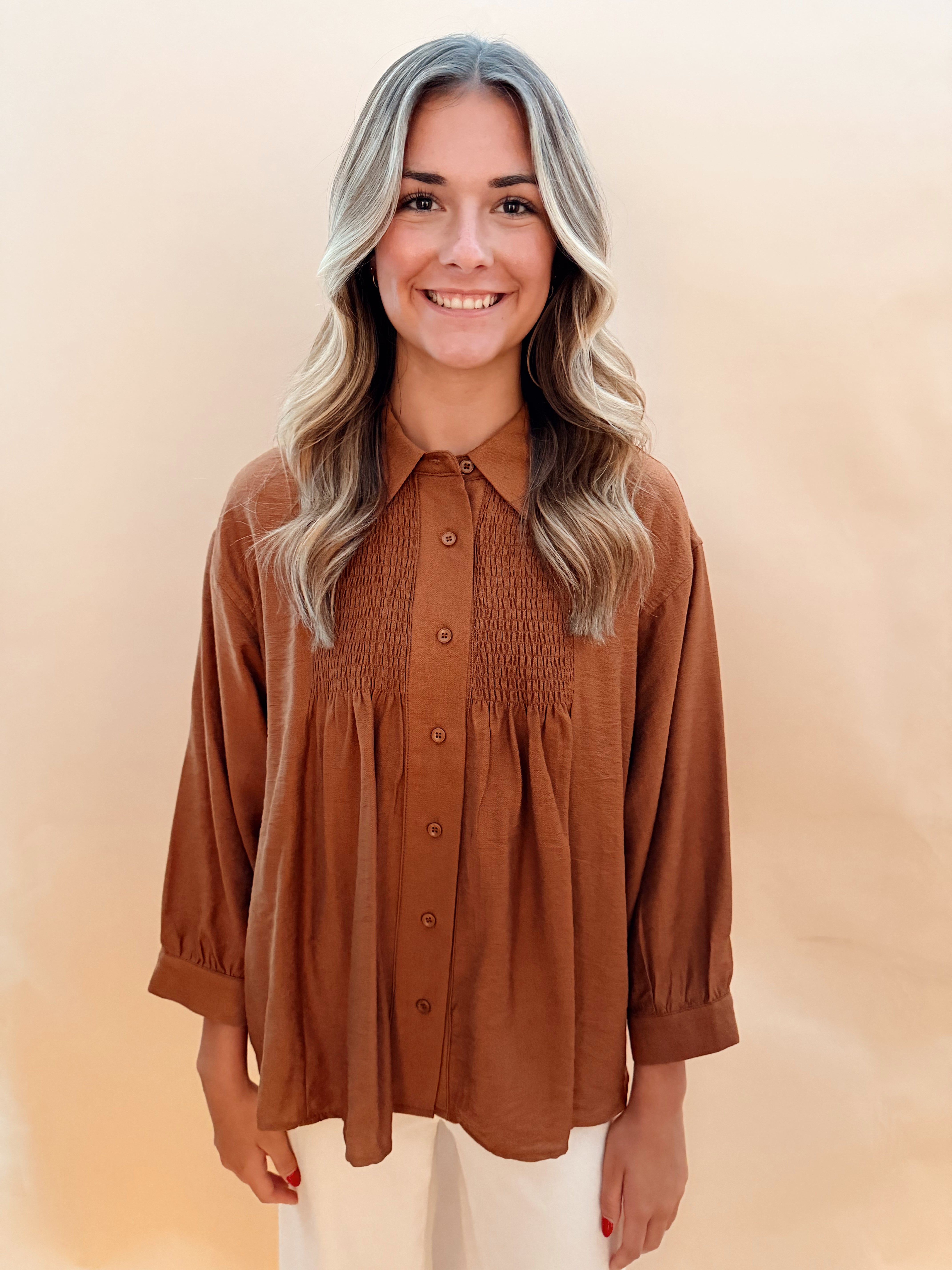 Long sleeved button blouse smock details
