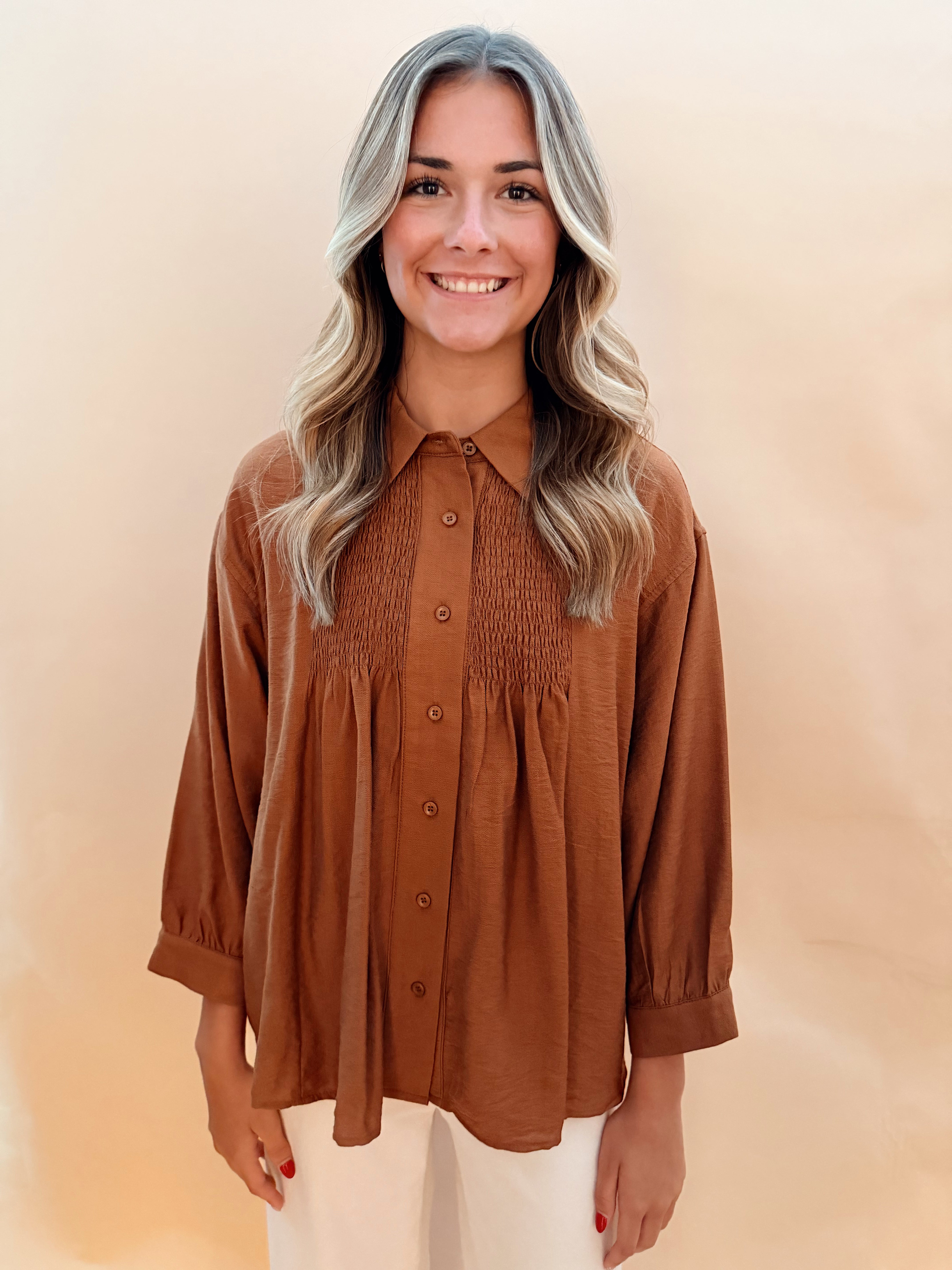 Long sleeved button blouse smock details