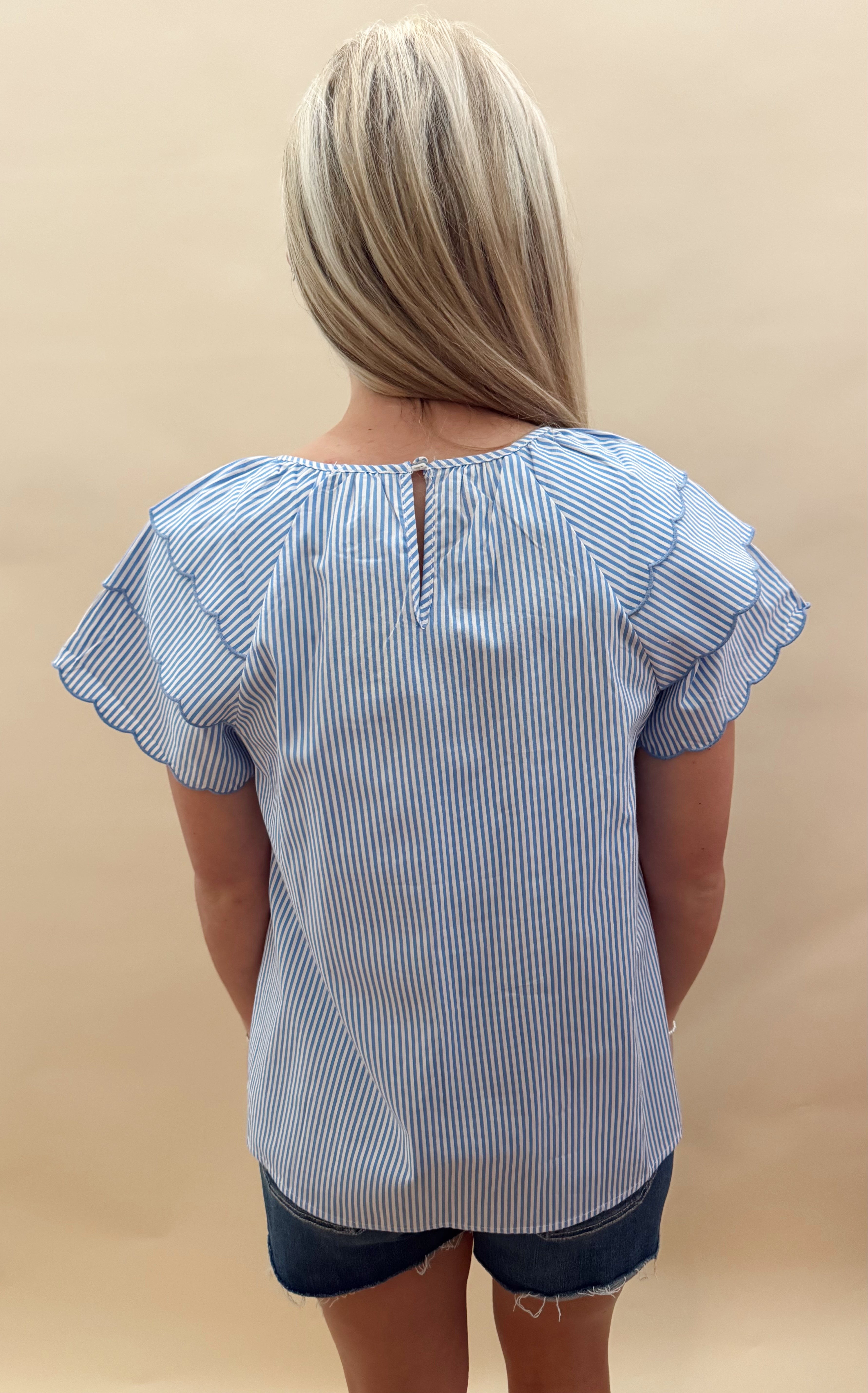 Blue and white striped top