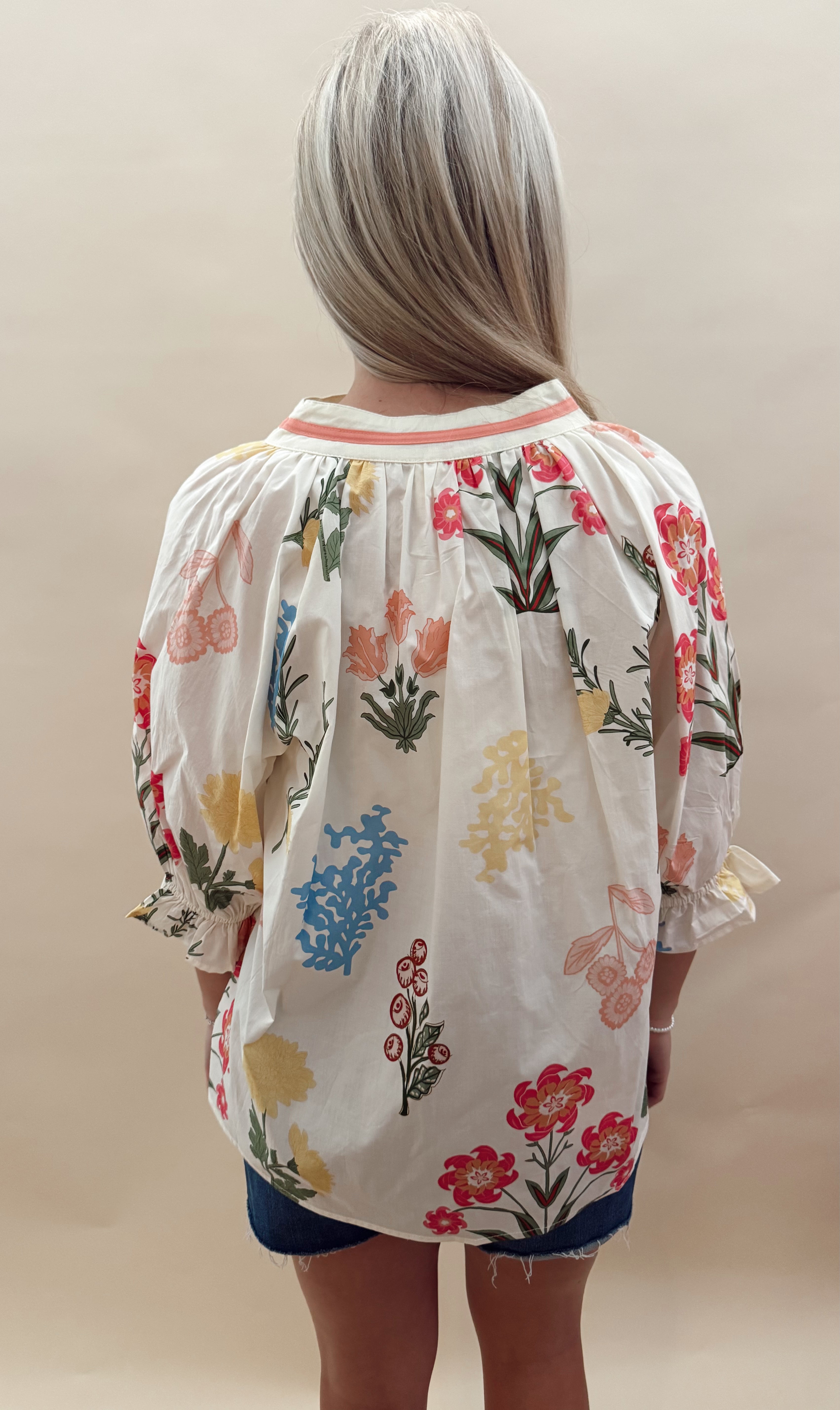 Cream with floral pattern top