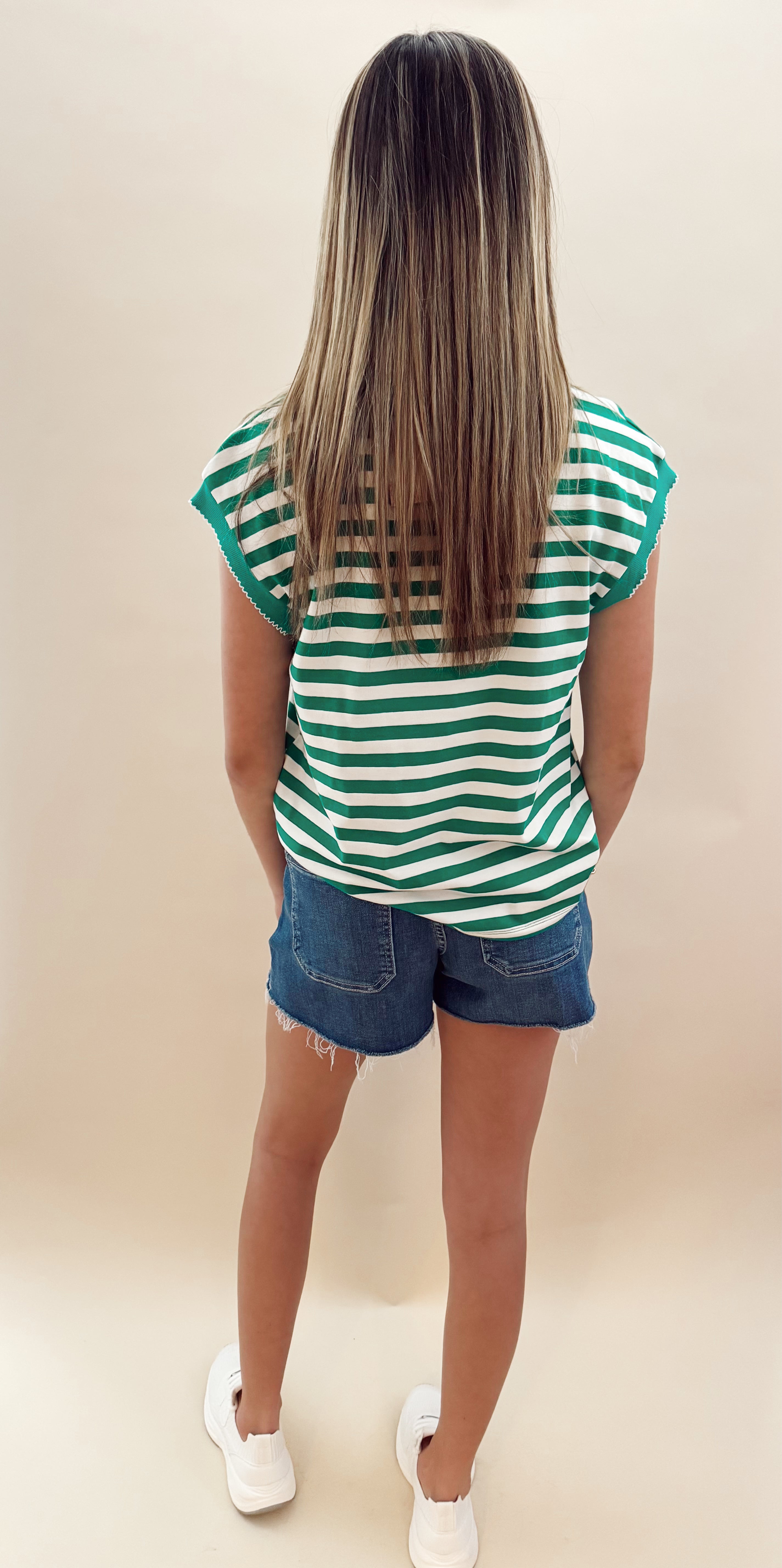 Green and white striped top