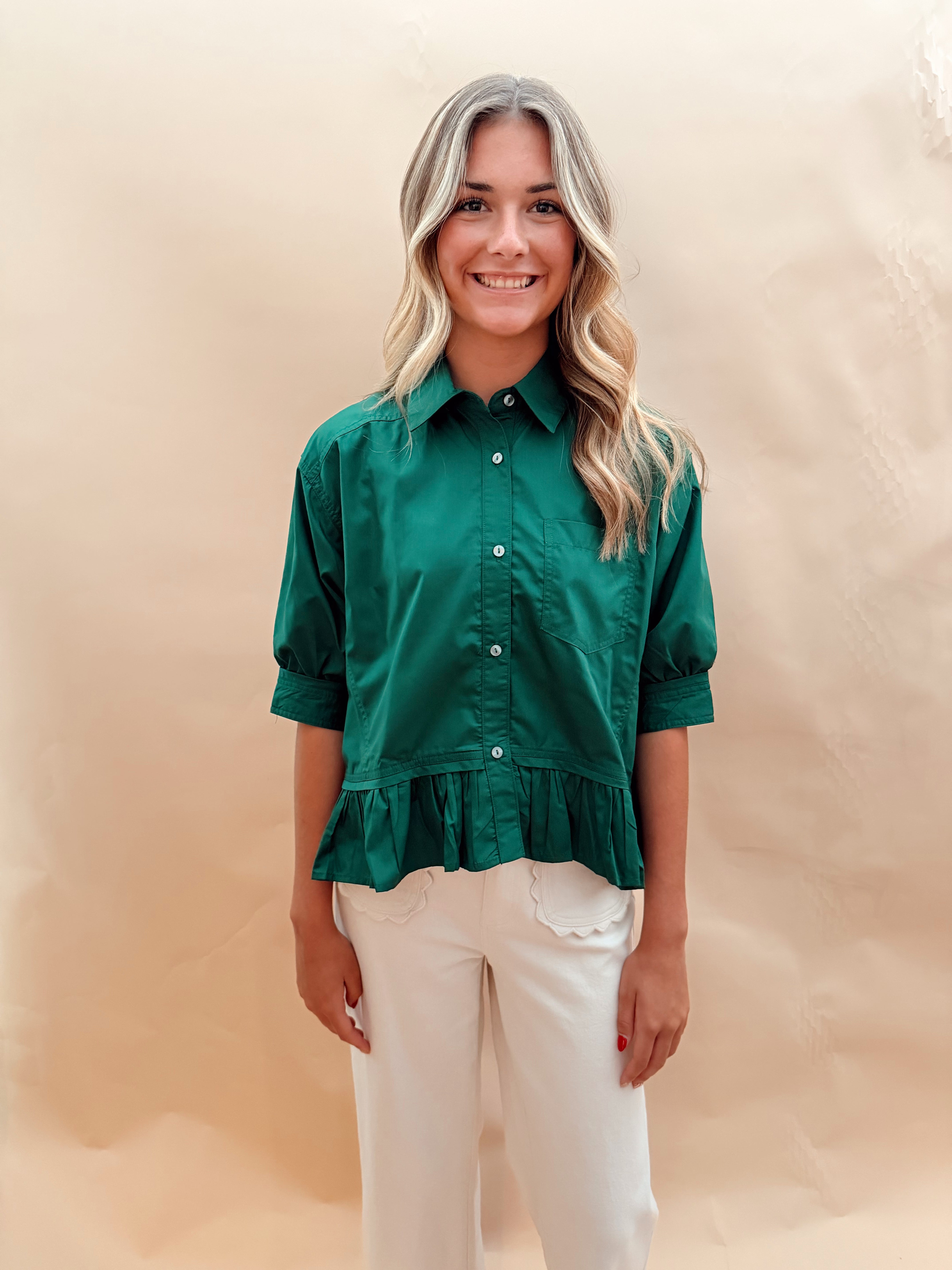 Solid peplum top