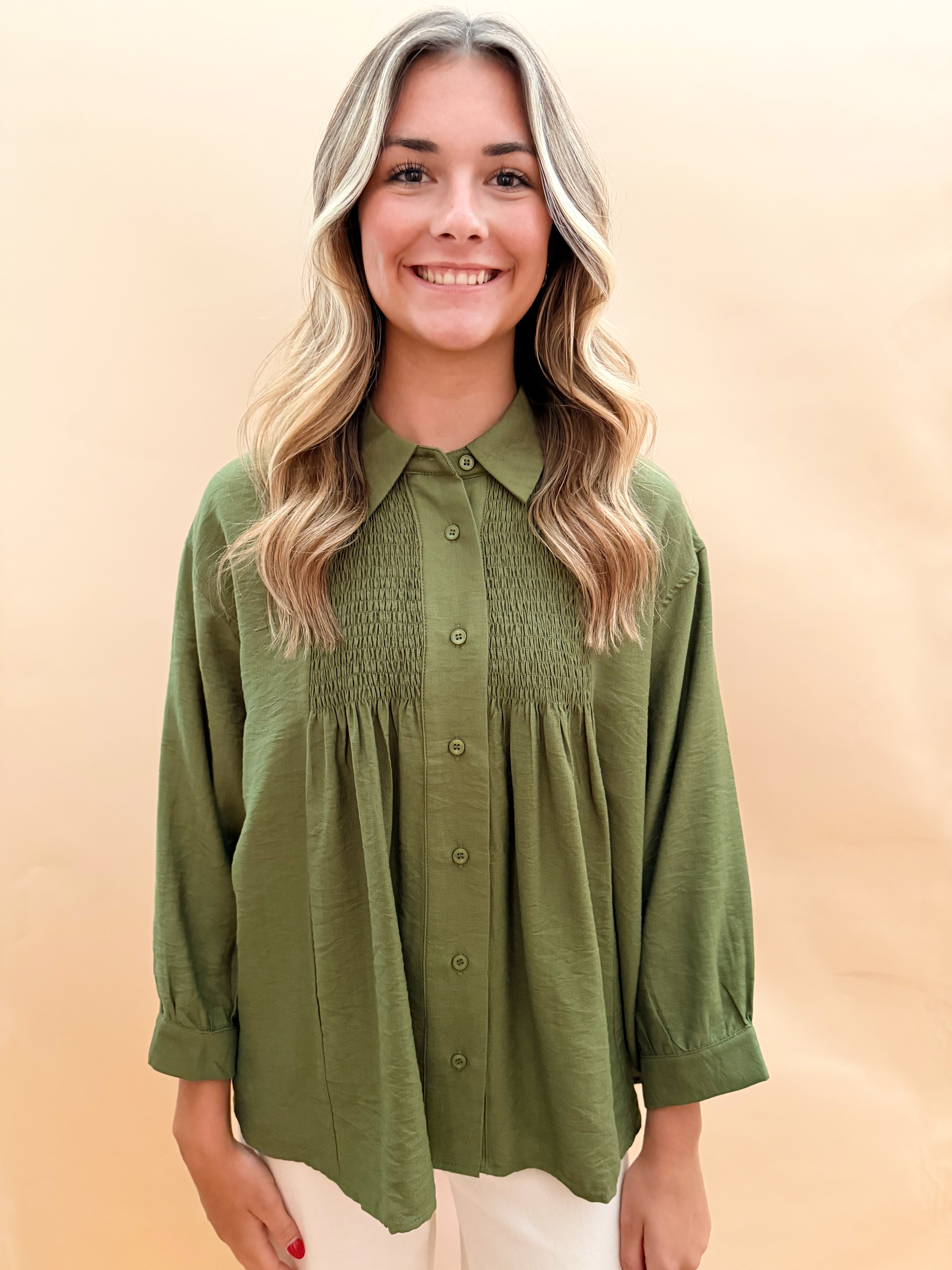 Long sleeved button blouse smock details