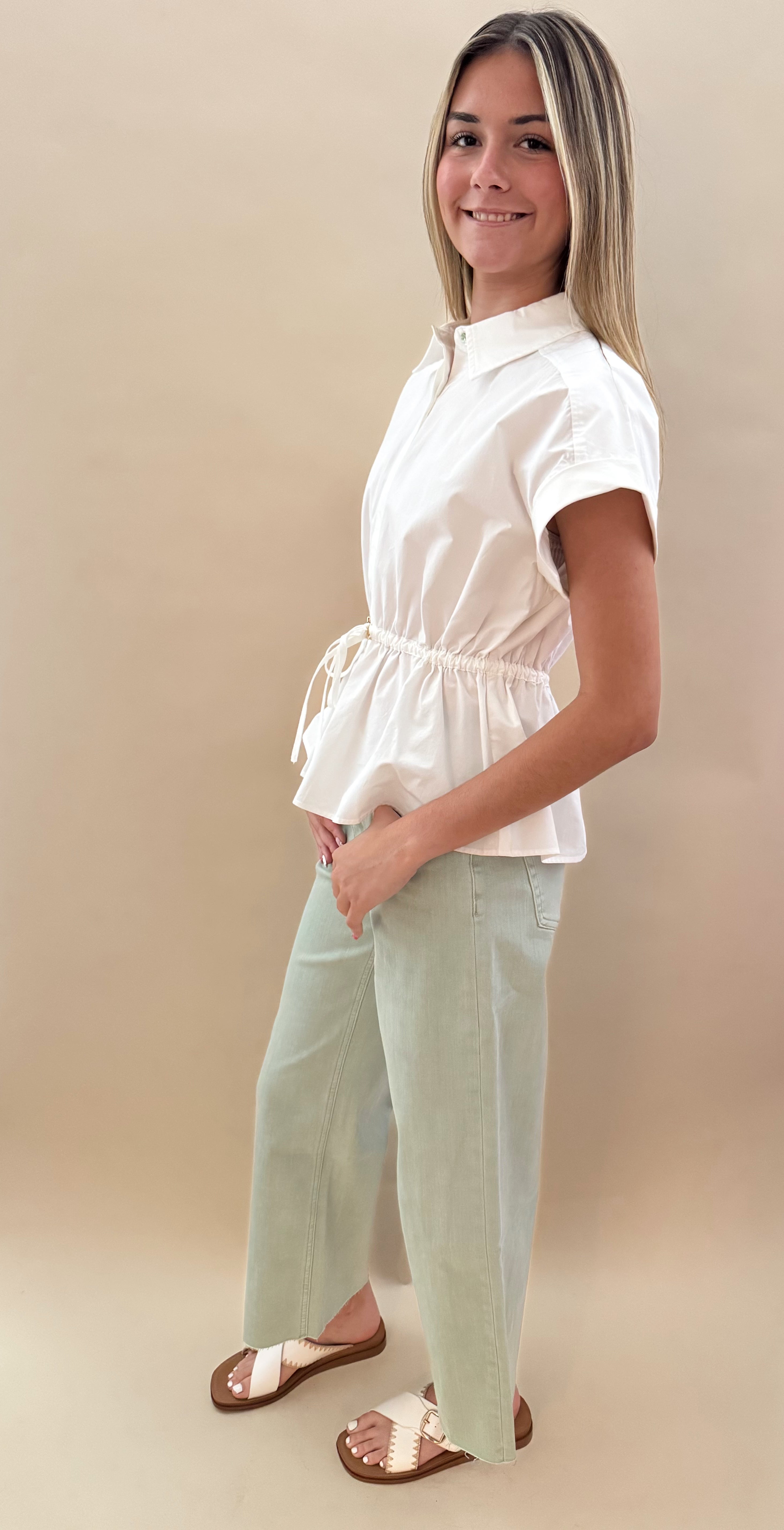 White button-up collared top