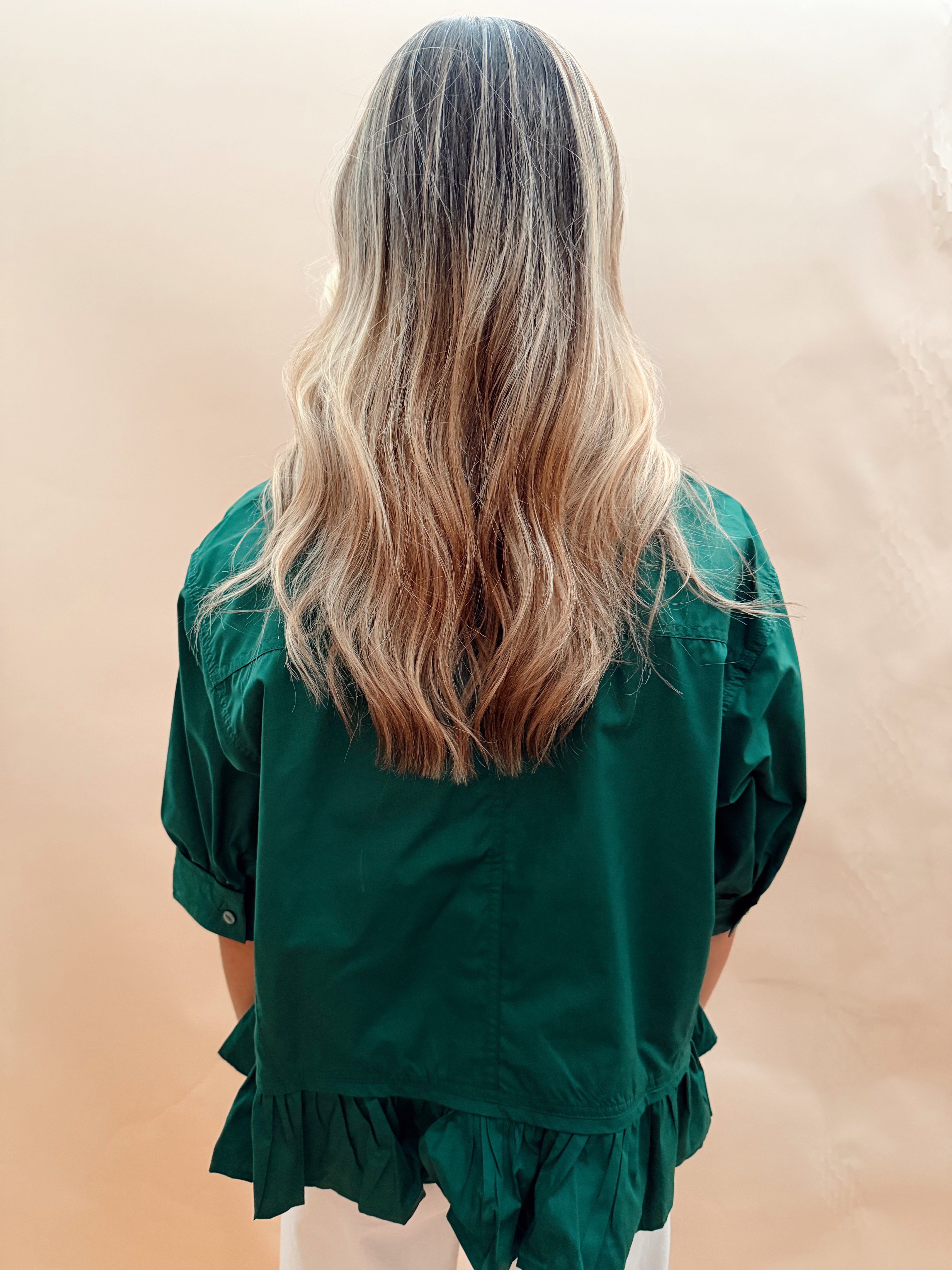 Solid peplum top