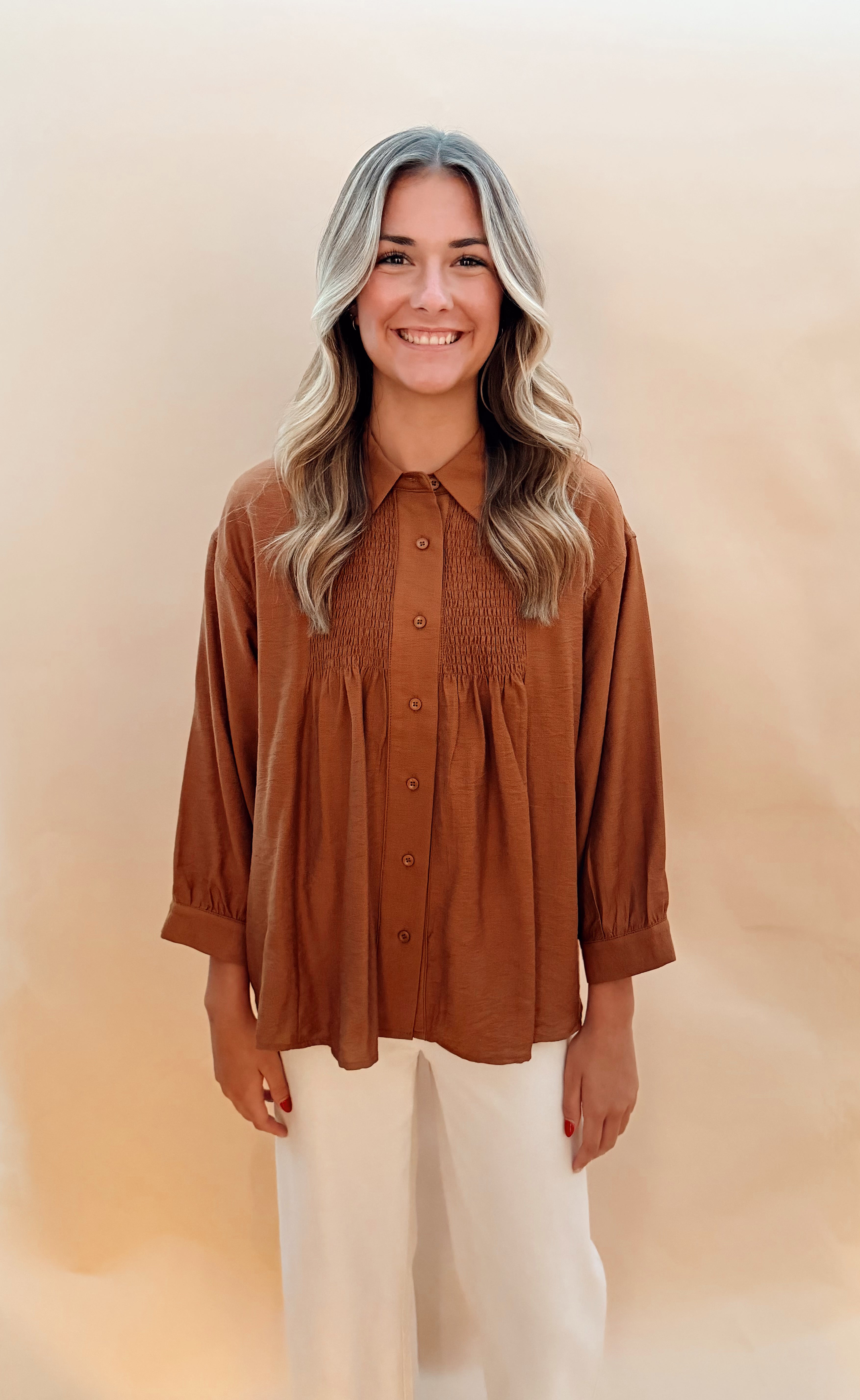 Long sleeved button blouse smock details
