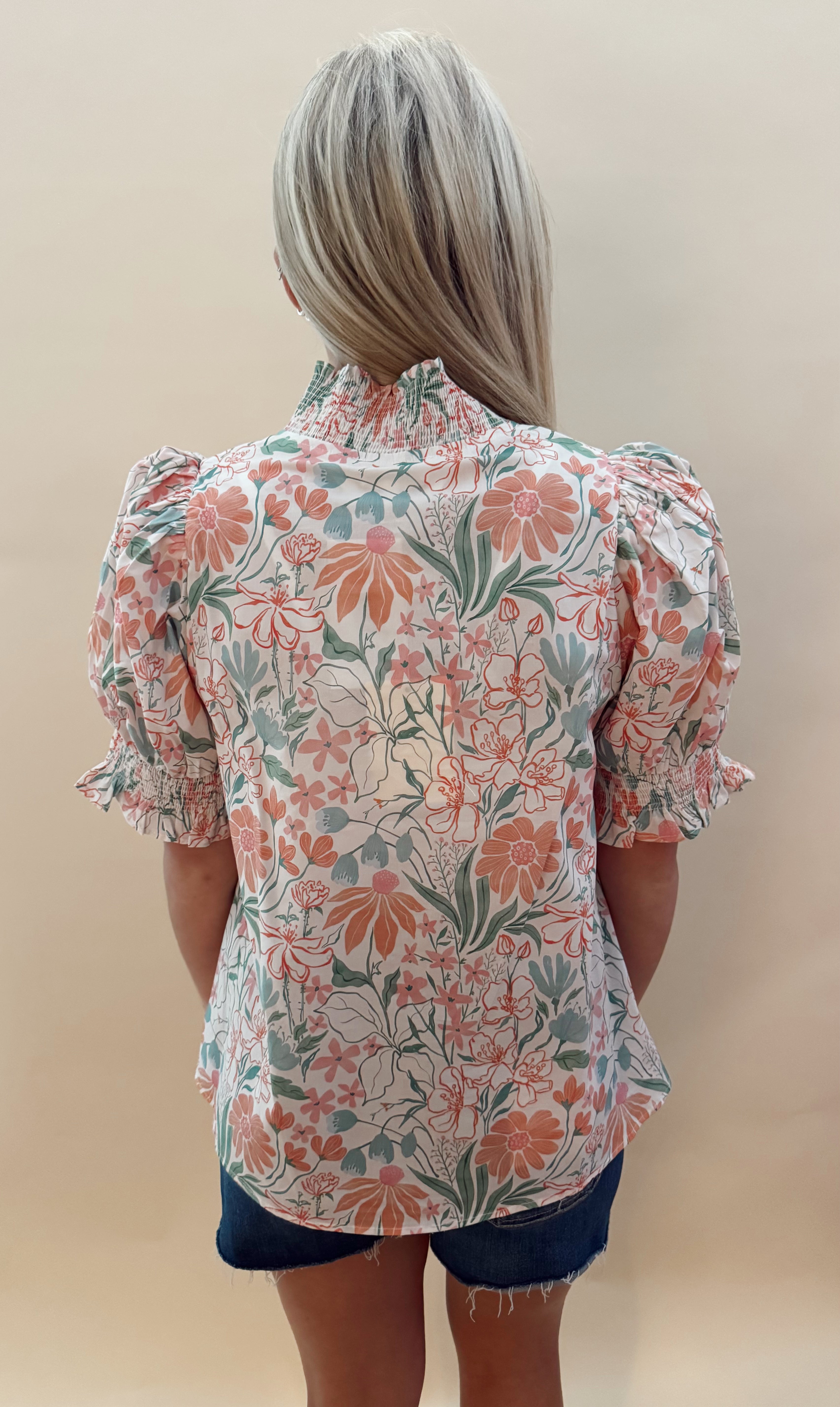 Peach and teal floral top