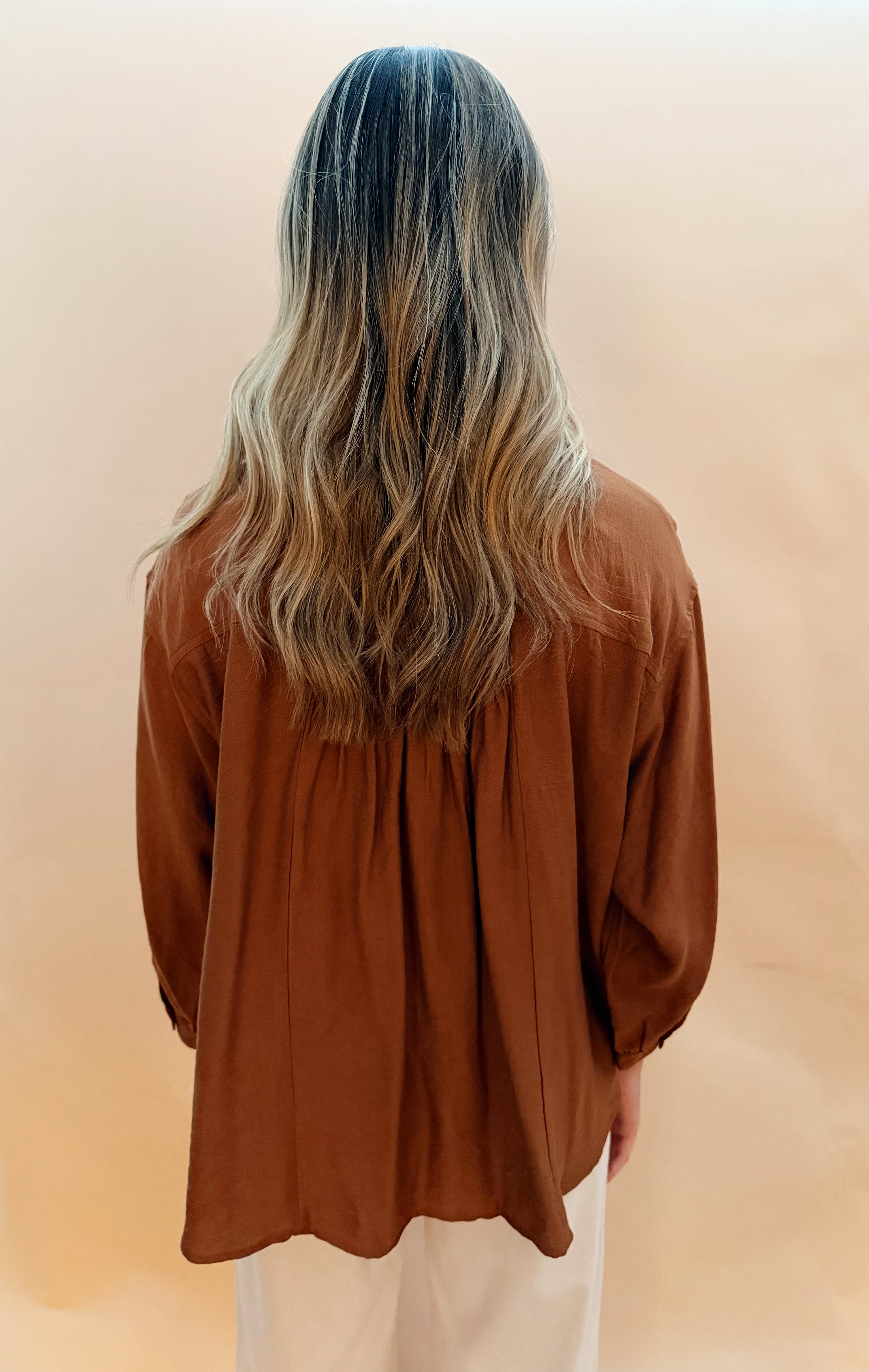 Long sleeved button blouse smock details