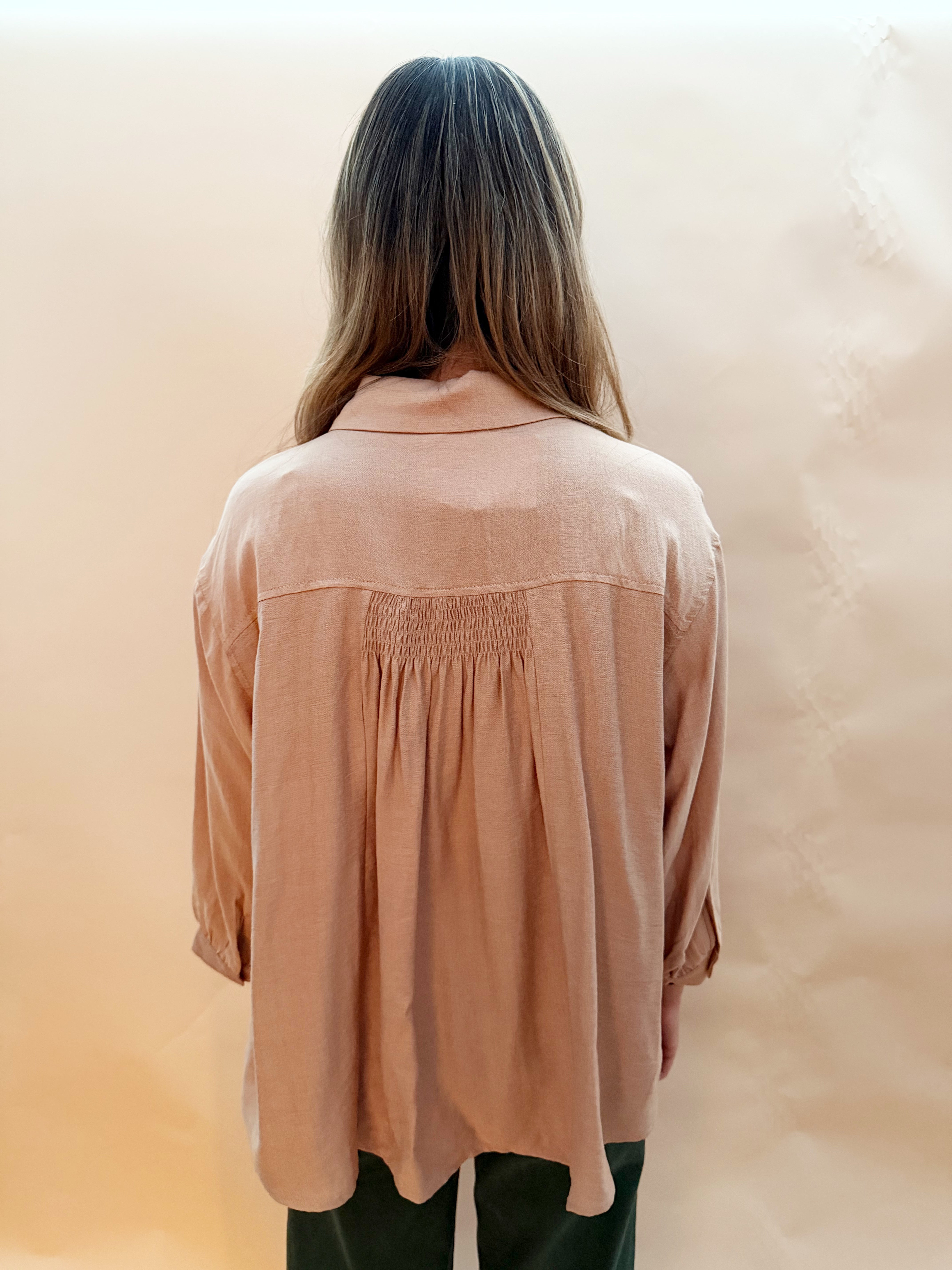 Long sleeved button blouse smock details