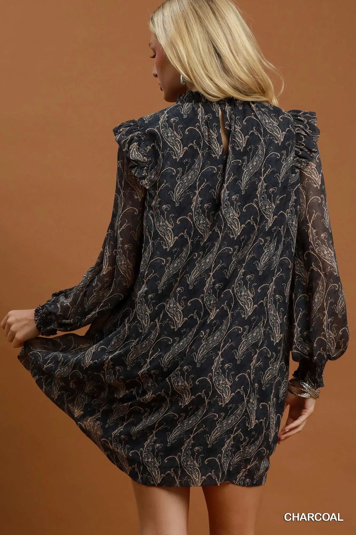 Abstract print mini dress with ruffles